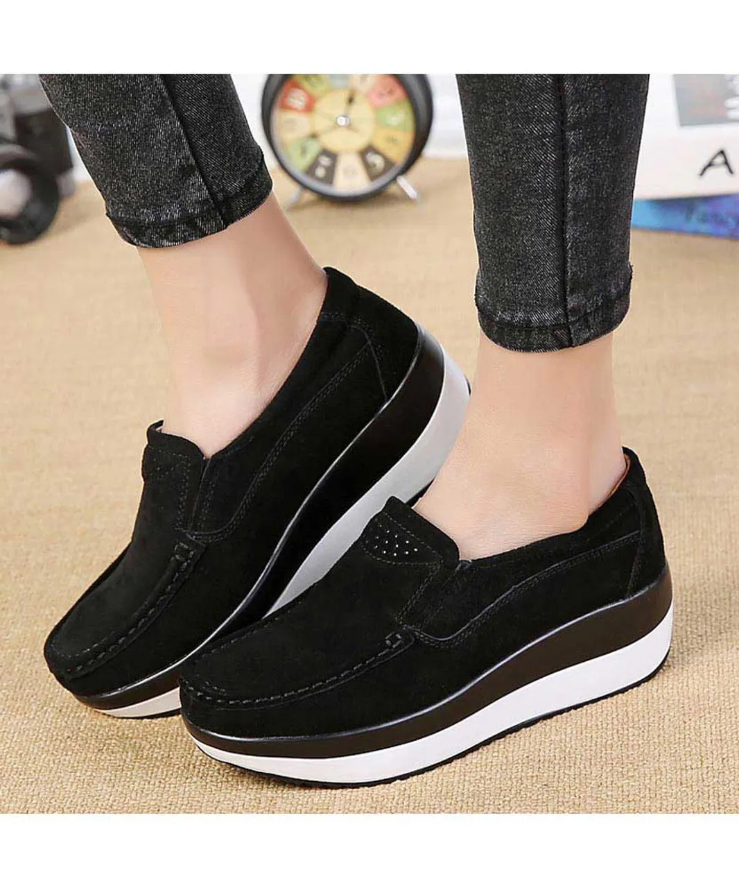 Black suede slip on rocker bottom shoe sneaker