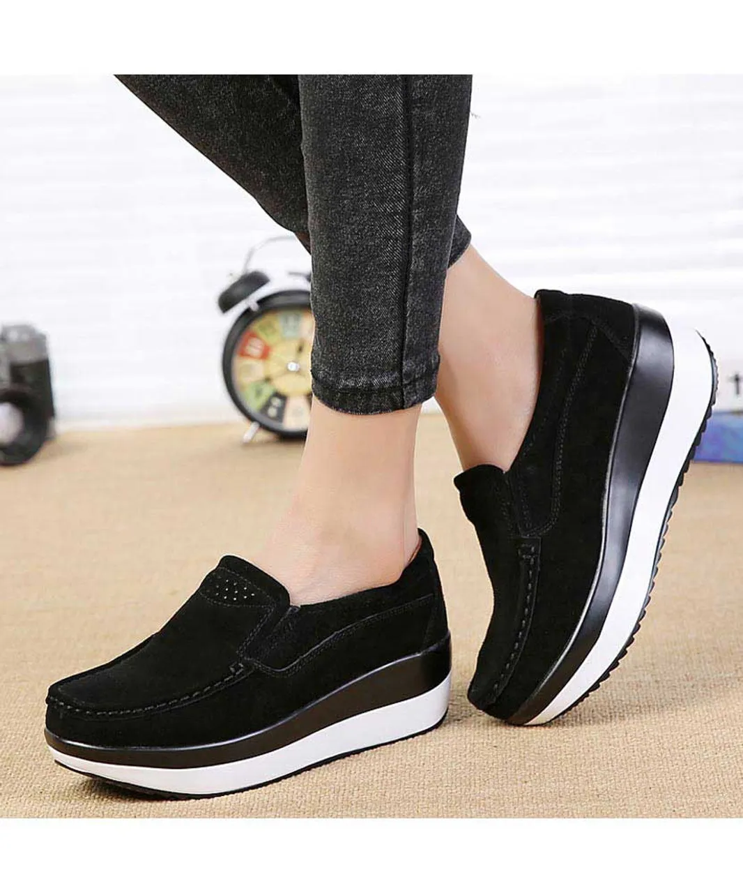 Black suede slip on rocker bottom shoe sneaker